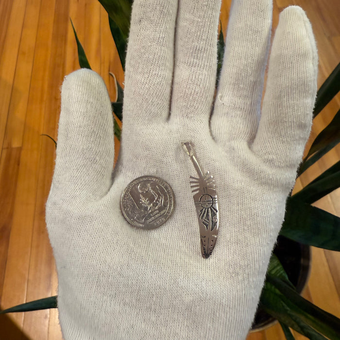 Hopi Sunface and Feather Silver Overlay Pendant, by Willis Humeyestewa