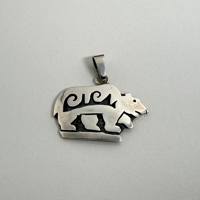 Hopi Silver Overlay Bear in the Storm Pendant, by Bryan Kagenveama