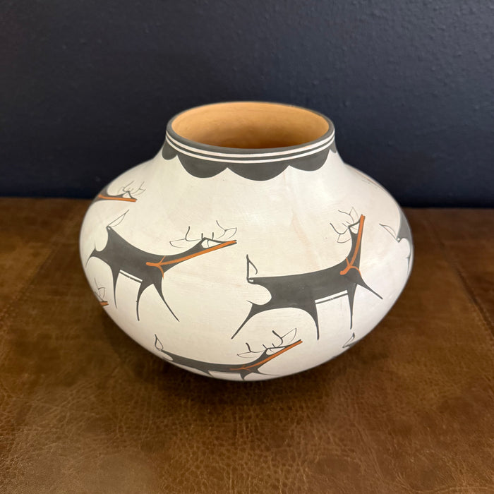 Deer Heartline on White Slip Pot, by Anderson Peynetsa