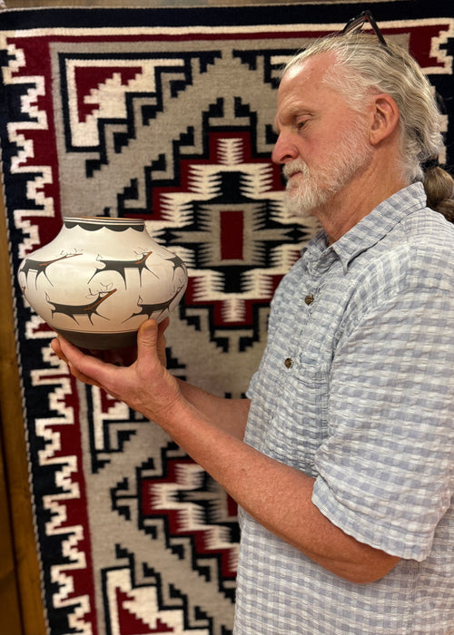 Deer Heartline on White Slip Pot, by Anderson Peynetsa