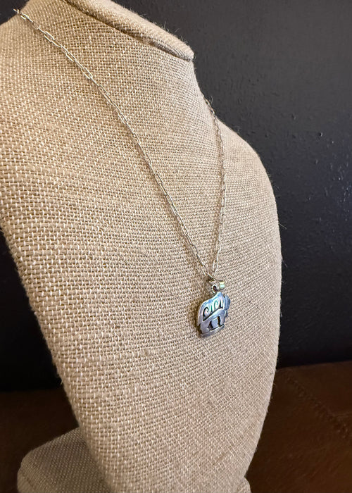 Hopi Silver Overlay Bear in the Storm Pendant, by Bryan Kagenveama