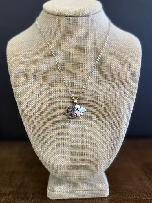 Hopi Silver Overlay Bear in the Storm Pendant, by Bryan Kagenveama