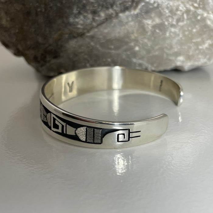 Hopi Silver Sun Face Bracelet, by Ronald Wadsworth– Raven Makes Hopi Silver Sun Face Bracelet, by Ronald Wadsworth– Raven Makes