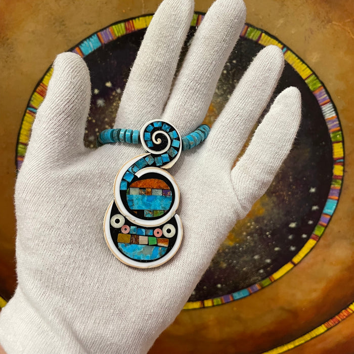 Cosmic Tadpole Necklace, by Mary L. Tafoya