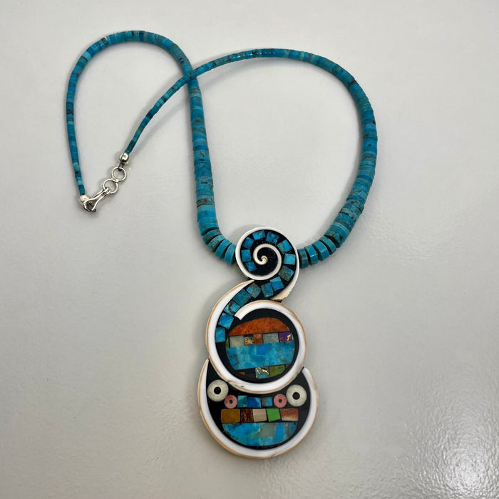 Cosmic Tadpole Necklace, by Mary L. Tafoya
