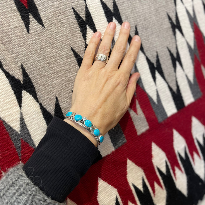 Sleeping Beauty Turquoise and Silver Zuni Snake Bracelet, by Jude Candelaria