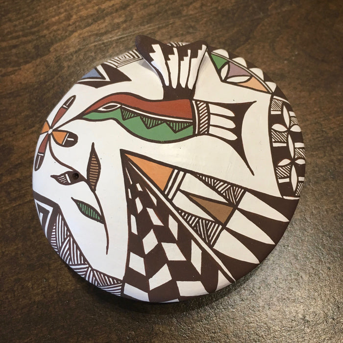 Hummingbird Acoma Pot, by Carolyn Concho, at Raven Makes Gallery
