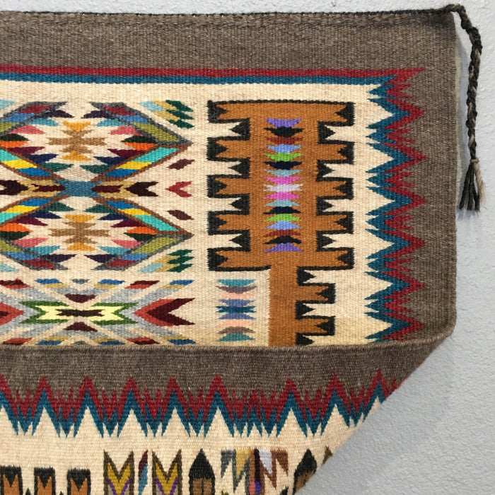Traditional Storm Pattern Navajo Rug with Vibrant Jewel Colors, by Bessie Littleben