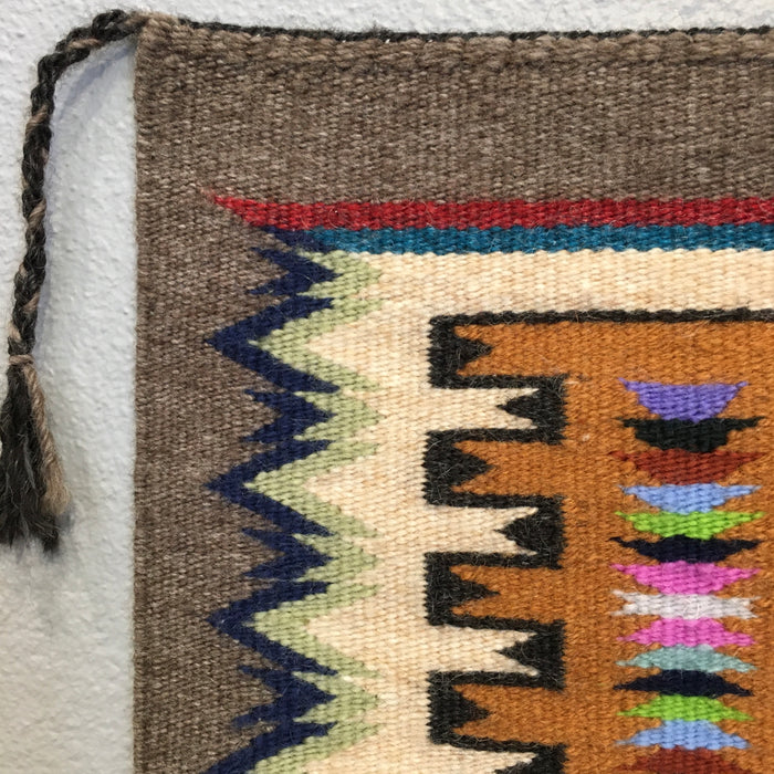 Traditional Storm Pattern Navajo Rug with Vibrant Jewel Colors, by Bessie Littleben