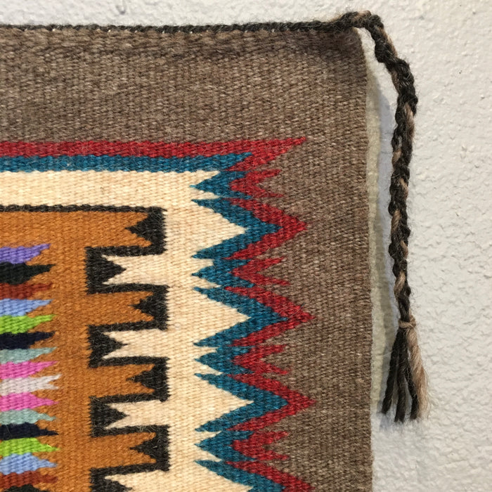 Traditional Storm Pattern Navajo Rug with Vibrant Jewel Colors, by Bessie Littleben