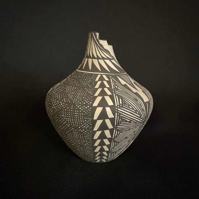 Acoma Fine Line Pottery, by Sandra Victorino