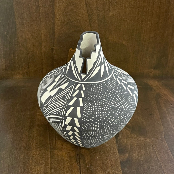 Acoma Fine Line Pottery, by Sandra Victorino