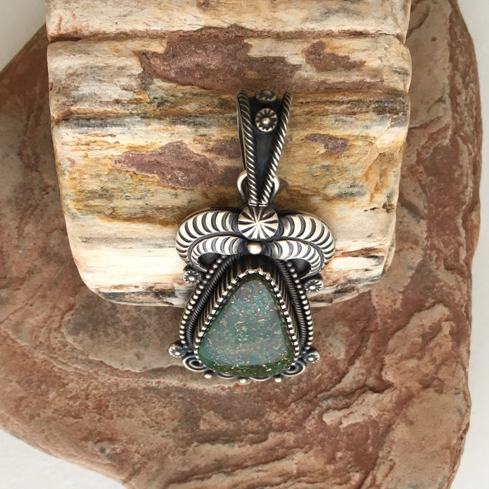 Turquoise Mountain and Silver Pendant, by Ivan Howard