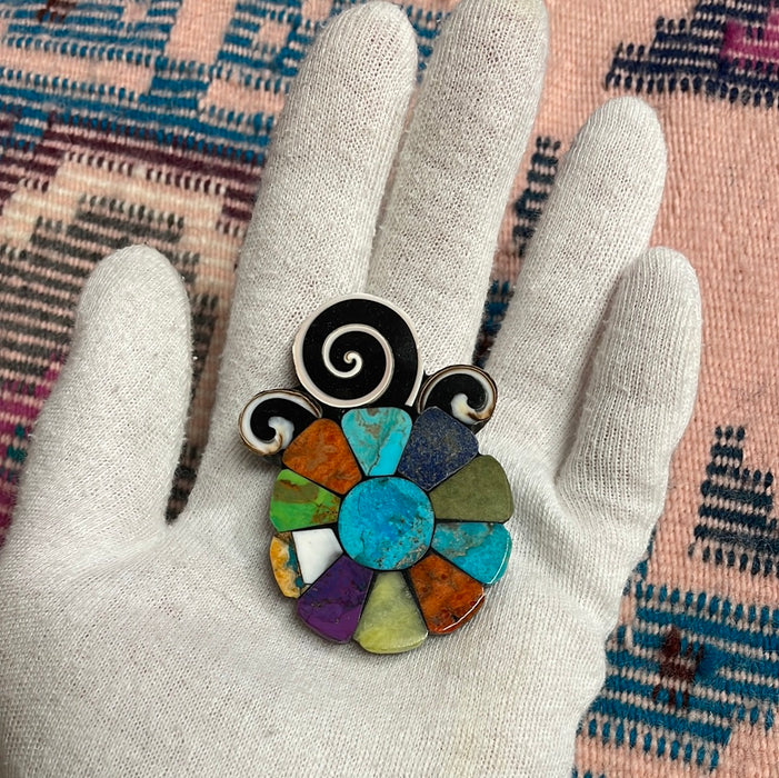 Blossom and Moisture Pendant, by Mary L. Tafoya
