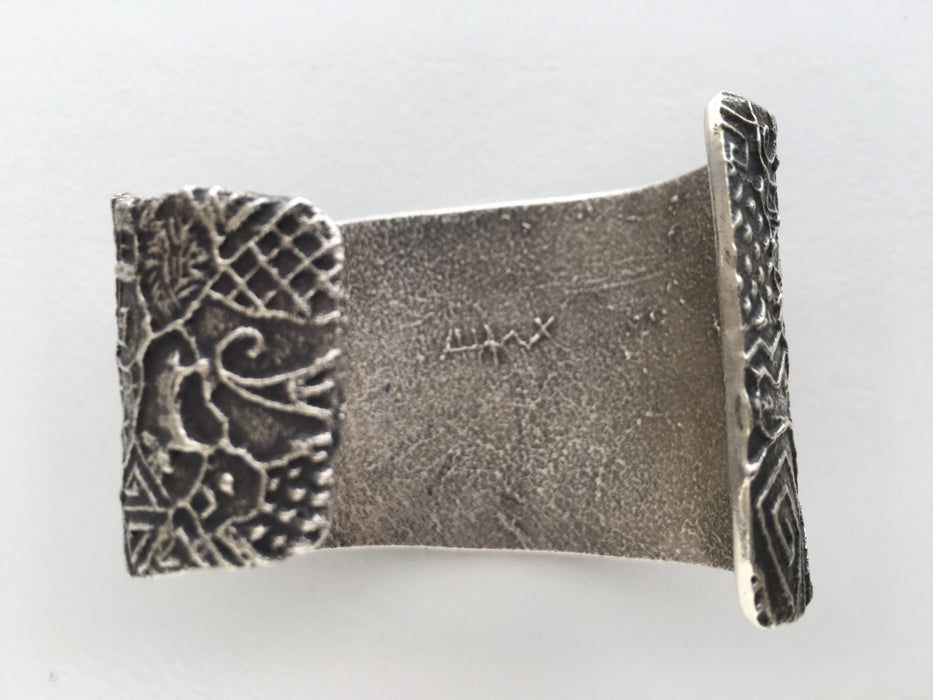 Hopi Silver Petroglyphs Tufa Cast Cuff Bracelet, by Antone Honanie