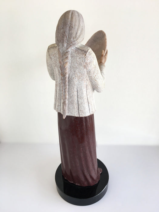 The Winnowing Song Sculpture, by Cliff Fragua